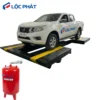 Cầu nâng 1 trụ rửa xe âm nền cánh bướm Ấn Độ nâng xe bán tải minh họa
