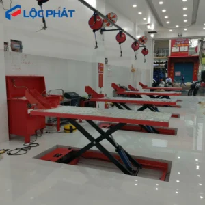 Setup khu vực dịch vụ HEAD với bàn nâng xe máy âm nền cắt kéo và rulo cuốn hơi
