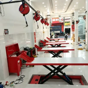 Lắp đặt đồng bộ hệ thống bàn nâng xe máy âm nền Lộc Phát mặt Inox tại trạm dịch vụ Head Honda