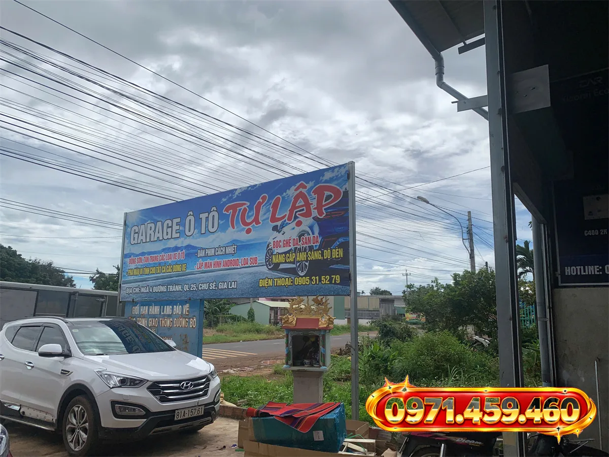 Biển hiệu Garage Ô Tô Tự Lập ngã 4 đường tránh Quốc Lộ 25 Chư Sê Gia Lai